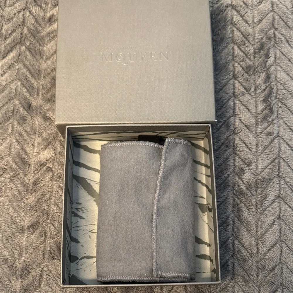 Alexander McQueen Black Phone Holder with Gold Skull Detail